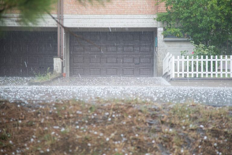 hailstones strong hurricane wind ice front - Is Your Garage Door Up to Code? Why It Matters in Hurricane Season