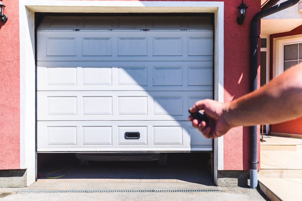PVC garage door. Use the remote control to close and open the garage door -  The Evolution of Garage Doors