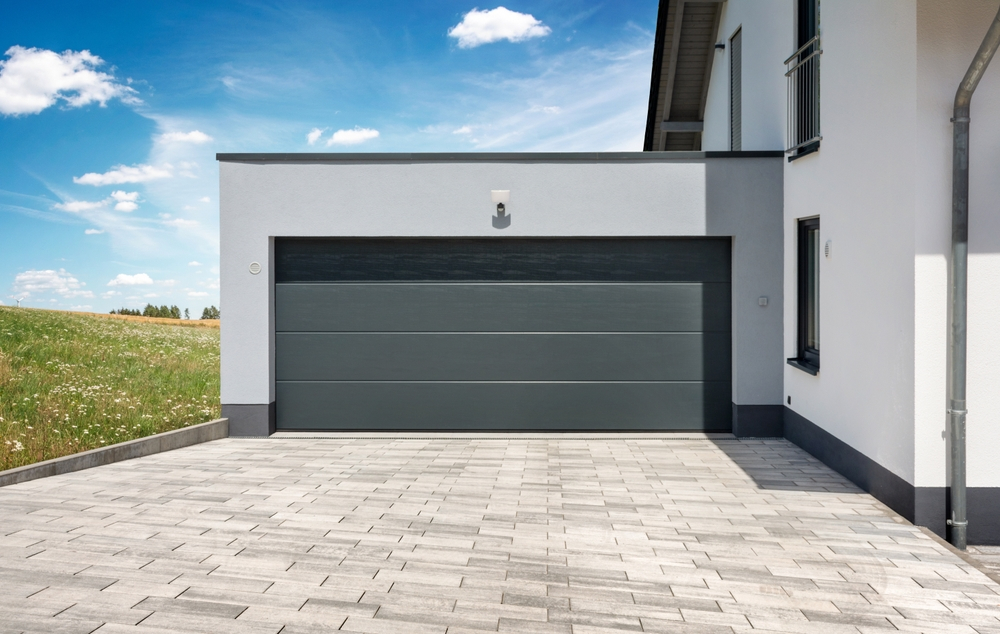 wind-resistant garage door protecting a modern home during a hurricane