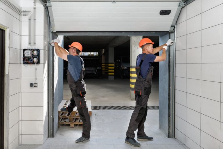 Expert technicians installing a state-of-the-art lift garage door in New Orleans.