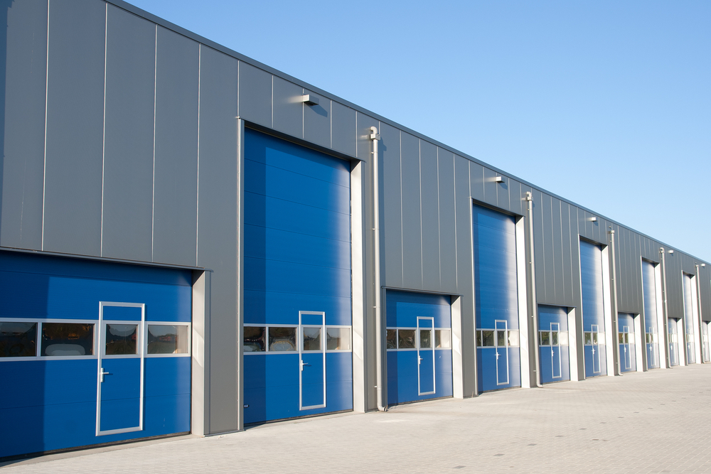 blue industrial garage doors with a window, Top Features to Look for in an Industrial Garage Door